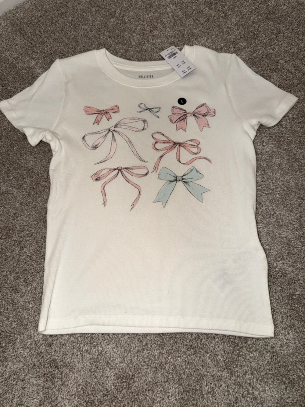 Hollister Cream Short Sleeve Tee with Pastel Bow Motif